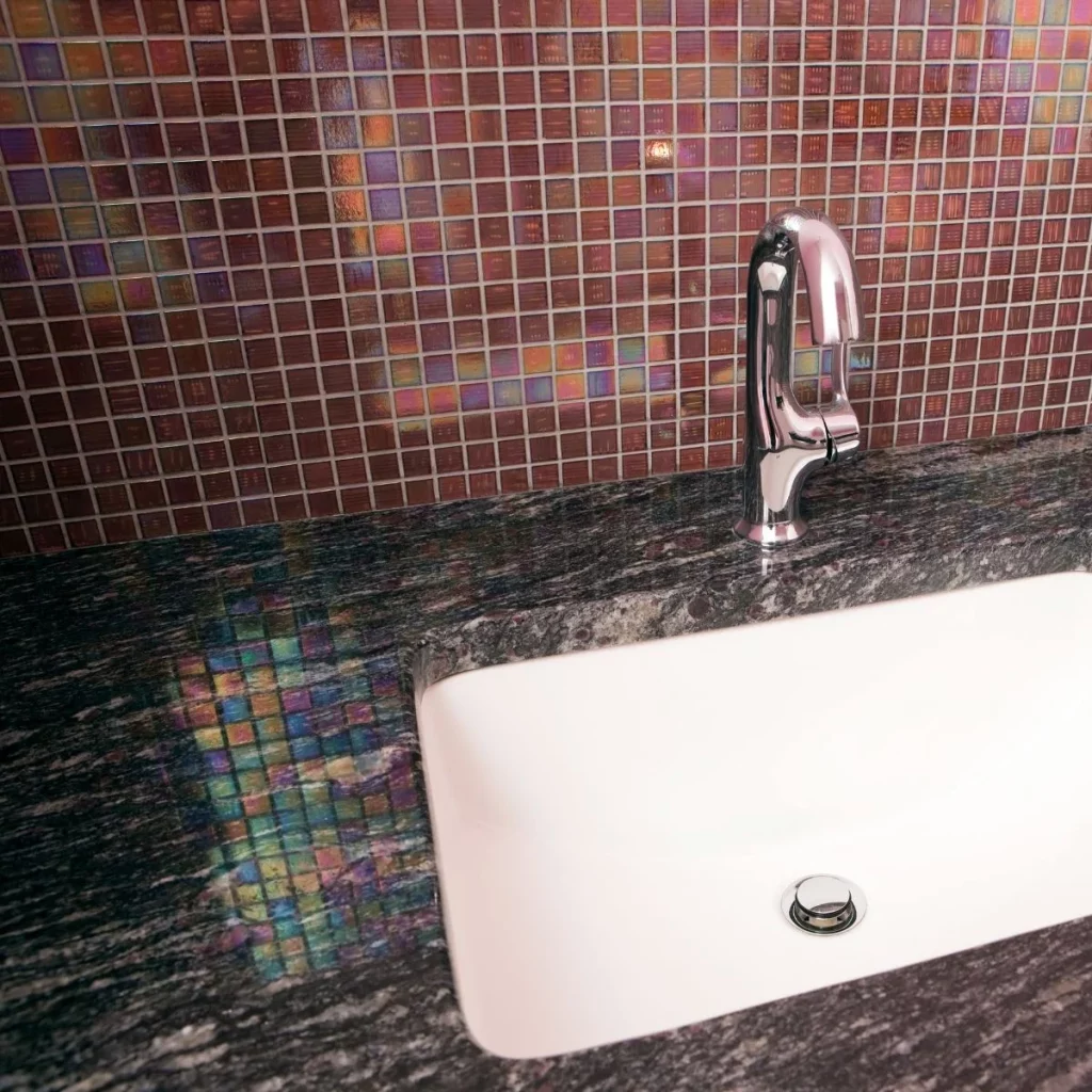 Reflective Black Granite Worktop In Bathroom